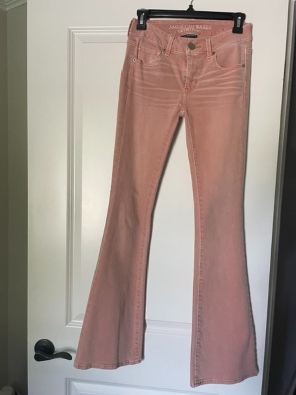 American Eagle distressed salmon color jeans. Size 0 in Boho Artist style